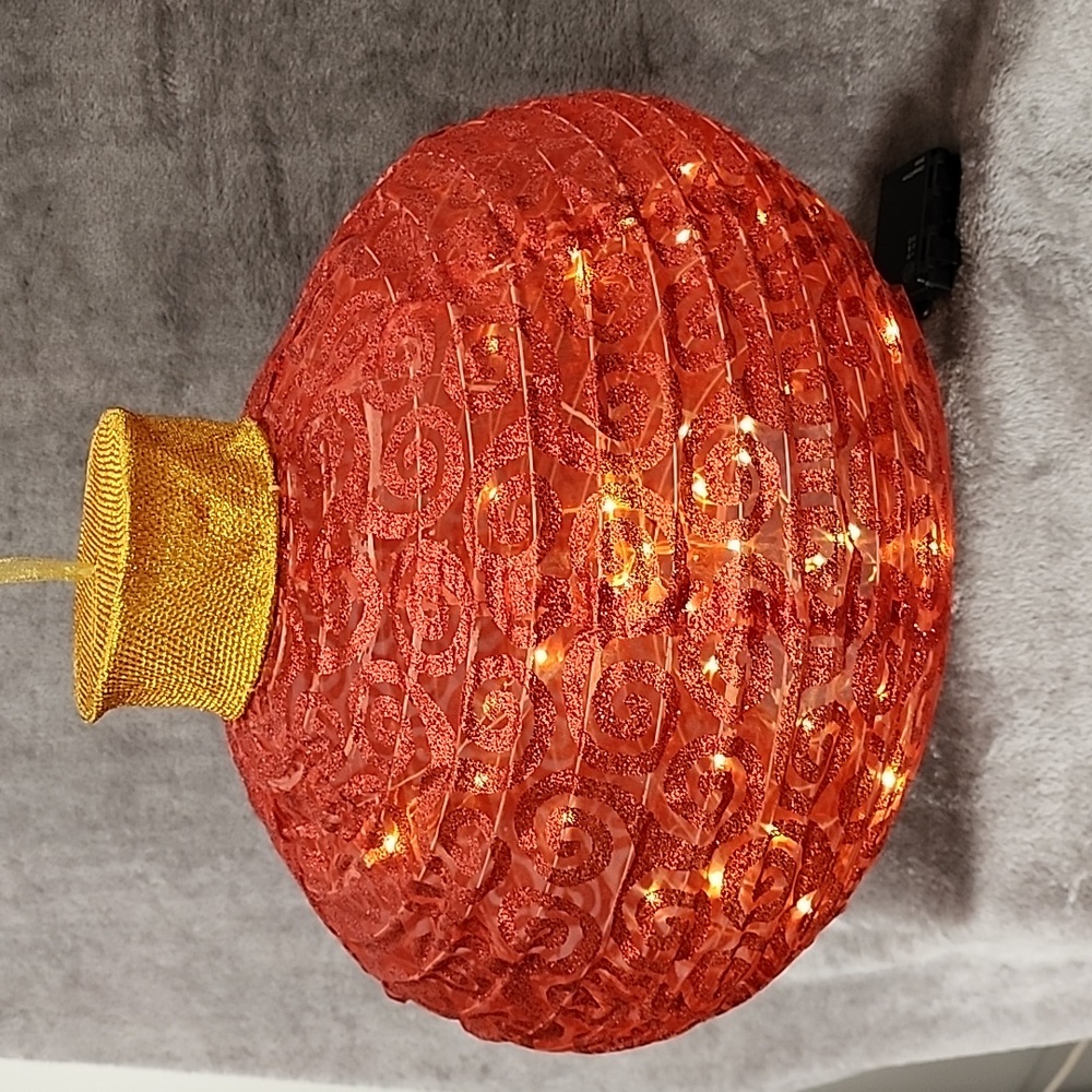 Lighted Large Ornament Lantern. 15 inches tall and 17.5 inches wide.